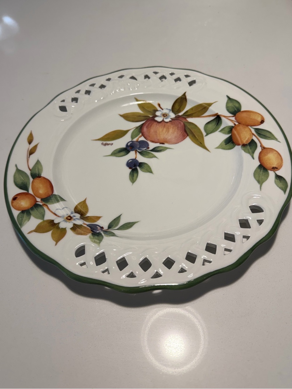 Brunelli dinner plate "Tiffany" pattern, lattice edge fruit motif.